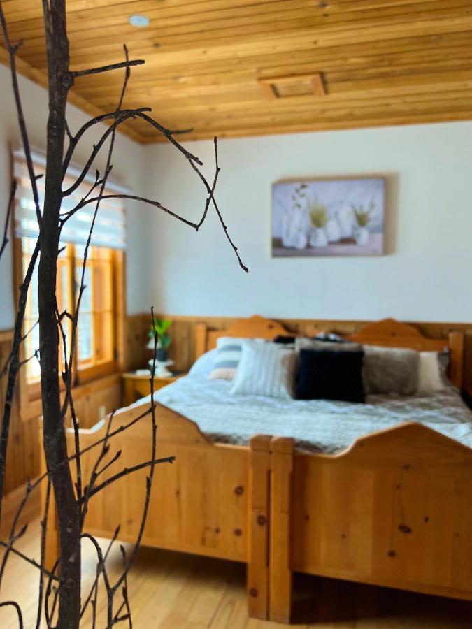 Auberge Au Poste De Traite Sainte-Famille Esterno foto