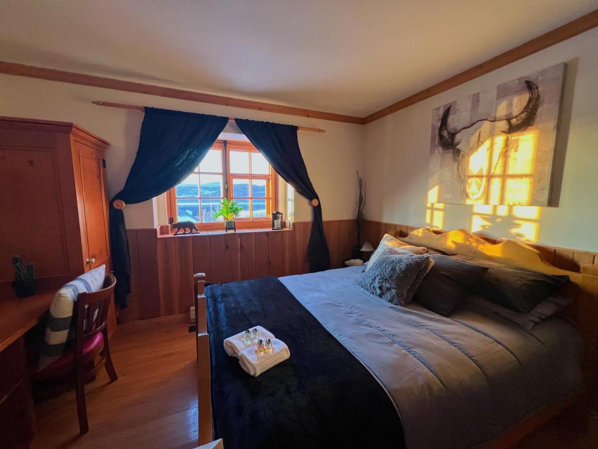 Auberge Au Poste De Traite Sainte-Famille Esterno foto